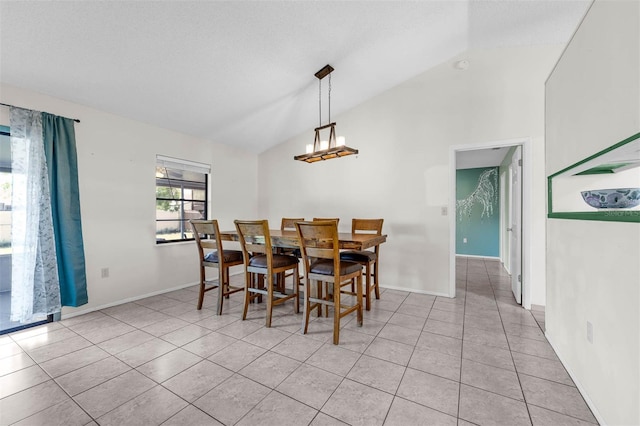 3205 Clewiston St, Deltona, FL 32738 - dining area featuring high vaulted ceiling, light tile patterned floors, and baseboards