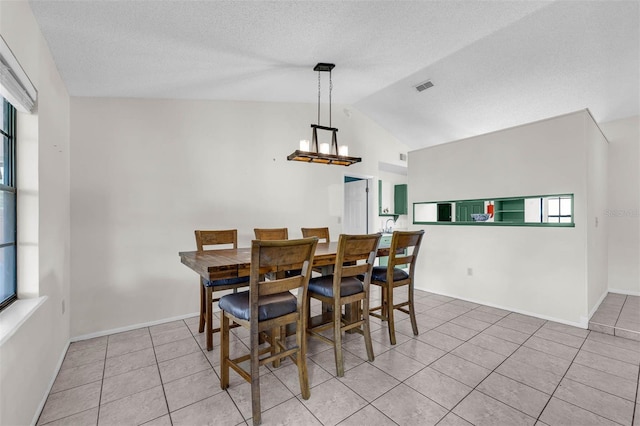 3205 Clewiston St, Deltona, FL 32738 - tiled dining area featuring visible vents, a wealth of natural light, and vaulted ceiling