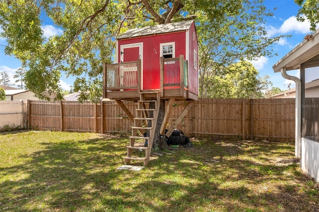 3205 Clewiston St, Deltona, FL 32738 - exterior space featuring a fenced backyard and a lawn