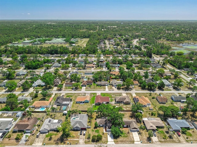 3205 Clewiston St, Deltona, FL 32738 - birds eye view of property featuring a wooded view and a residential view