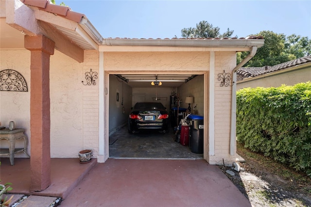 view of vehicle parking with concrete driveway and a garage