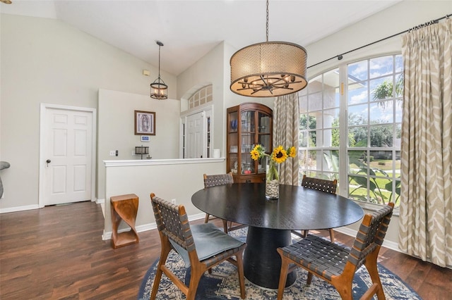 11506 Clair Pl, Clermont, FL 34711 - dining space with baseboards, high vaulted ceiling, and wood finished floors