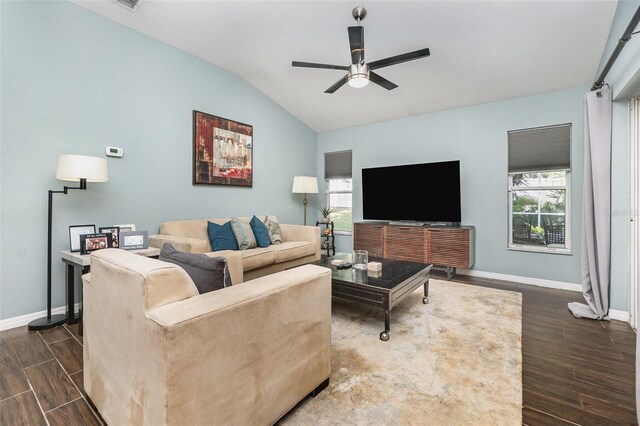 11506 Clair Pl, Clermont, FL 34711 - living area featuring dark wood finished floors, baseboards, ceiling fan, and lofted ceiling