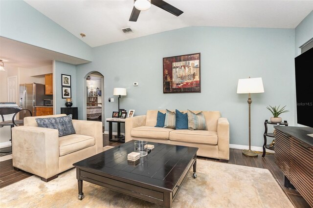 11506 Clair Pl, Clermont, FL 34711 - living area with visible vents, arched walkways, a ceiling fan, and vaulted ceiling