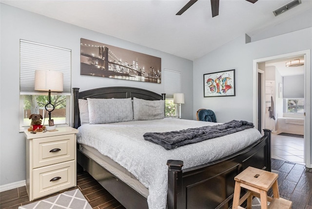 11506 Clair Pl, Clermont, FL 34711 - bedroom with lofted ceiling, dark wood-style flooring, visible vents, and multiple windows