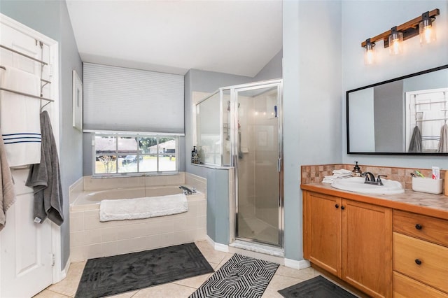 11506 Clair Pl, Clermont, FL 34711 - bathroom with a garden tub, a shower stall, tile patterned flooring, and vanity