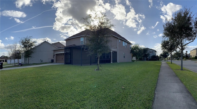 14841 Porter Rd, Winter Garden, FL 34787 - view of side of property with driveway, an attached garage, a lawn, and stucco siding