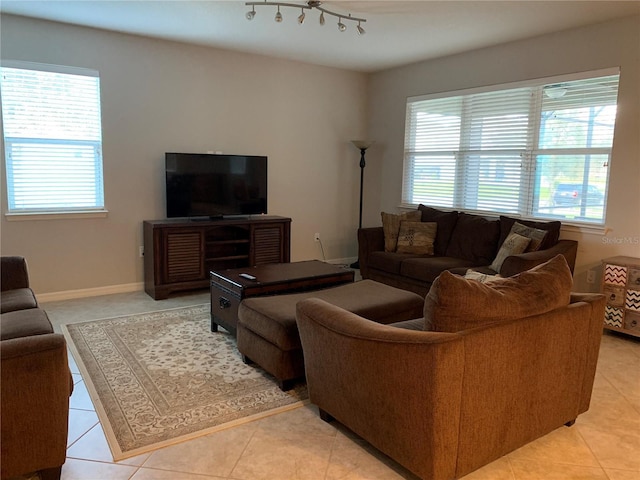 14841 Porter Rd, Winter Garden, FL 34787 - living room featuring a healthy amount of sunlight and light tile patterned floors