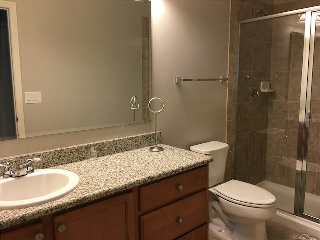 14841 Porter Rd, Winter Garden, FL 34787 - full bathroom featuring a shower stall, vanity, and toilet