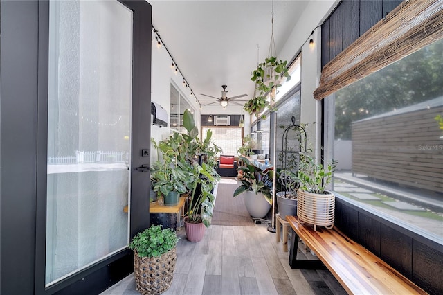 balcony featuring a ceiling fan