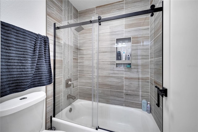 full bath featuring bath / shower combo with glass door and toilet