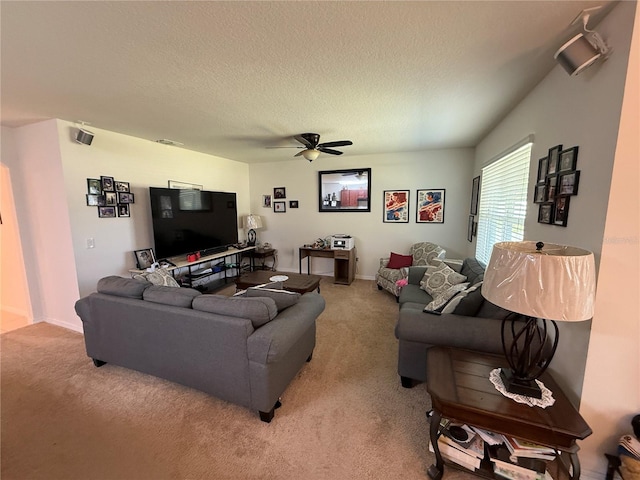 3702 Maidencain St, Clermont, FL 34714 - living area featuring a ceiling fan, light colored carpet, and a textured ceiling