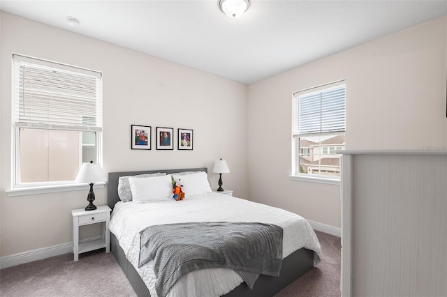 416 Southfield St, Kissimmee, FL 34747 - carpeted bedroom featuring baseboards