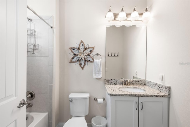 416 Southfield St, Kissimmee, FL 34747 - full bathroom featuring vanity, toilet, and tub / shower combination