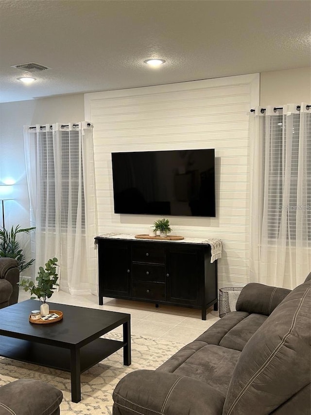 416 Southfield St, Kissimmee, FL 34747 - living room with a textured ceiling and visible vents