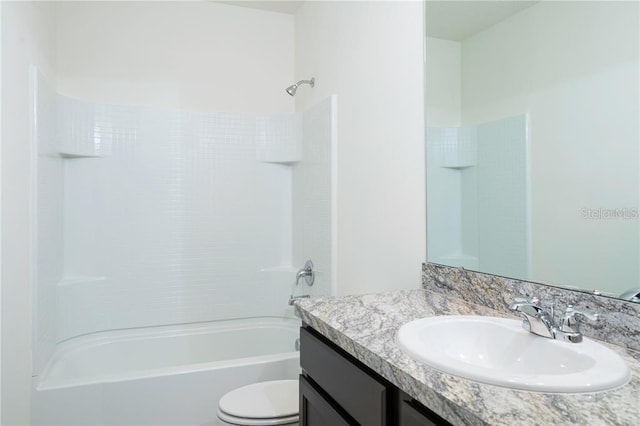 2607 Tulip Dr, Davenport, FL 33837 - full bathroom with toilet, vanity, and shower / bathtub combination