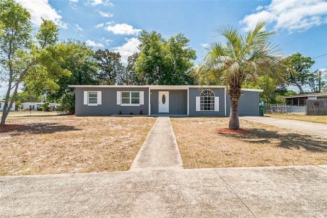 1234 Parker Ave, Deltona, FL 32725 - ranch-style home with driveway and fence