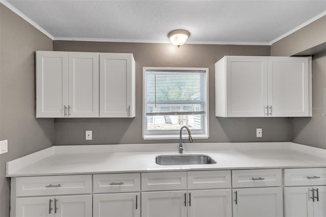 1234 Parker Ave, Deltona, FL 32725 - kitchen featuring white cabinetry, light countertops, and a sink