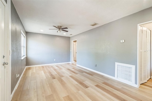 1234 Parker Ave, Deltona, FL 32725 - empty room with baseboards, visible vents, light wood-type flooring, and ceiling fan