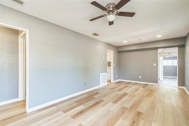 1234 Parker Ave, Deltona, FL 32725 - spare room featuring visible vents, ceiling fan, light wood-type flooring, and baseboards