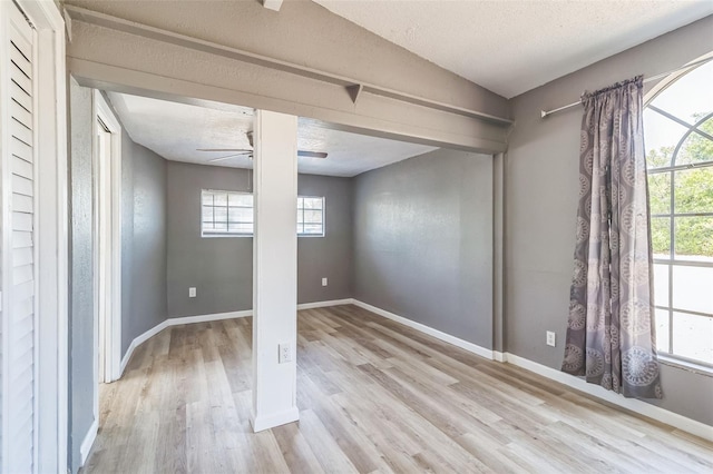 1234 Parker Ave, Deltona, FL 32725 - below grade area featuring ceiling fan, light wood finished floors, and baseboards