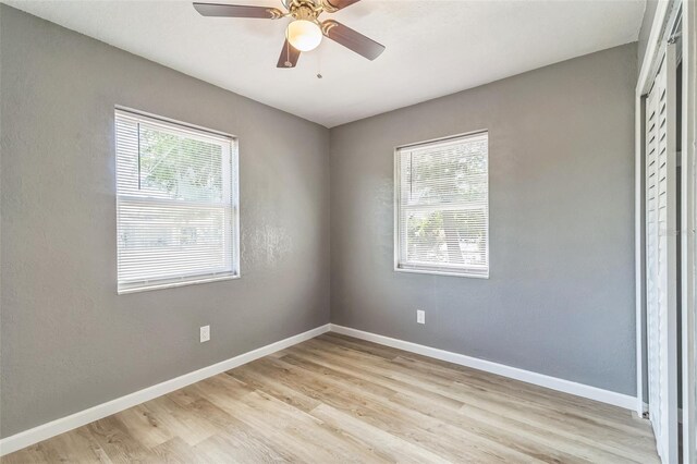 1234 Parker Ave, Deltona, FL 32725 - unfurnished room featuring baseboards, a ceiling fan, and light wood finished floors