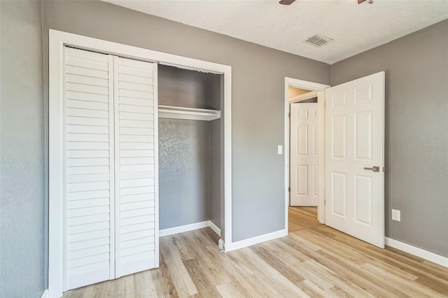 1234 Parker Ave, Deltona, FL 32725 - unfurnished bedroom with visible vents, baseboards, light wood-style flooring, and a closet