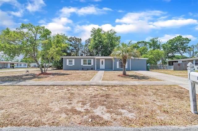 1234 Parker Ave, Deltona, FL 32725 - ranch-style home with fence and concrete driveway