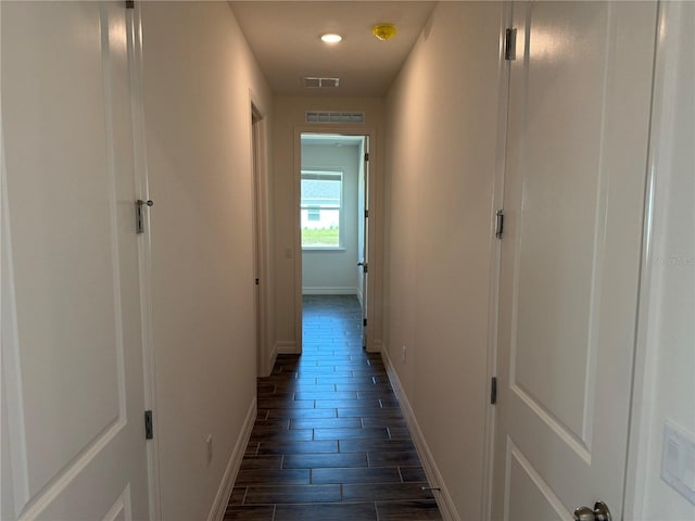 25126 Calusa Dr, Punta Gorda, FL 33955 - corridor with visible vents, baseboards, and wood tiled floor