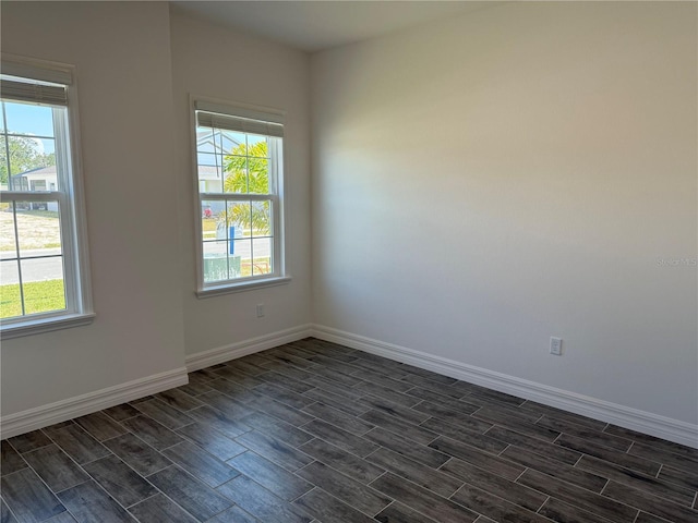 25126 Calusa Dr, Punta Gorda, FL 33955 - spare room featuring baseboards and wood tiled floor