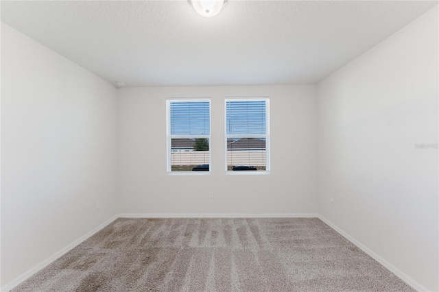 349 Guadlupe St, Haines City, FL 33844 - spare room featuring carpet floors and baseboards