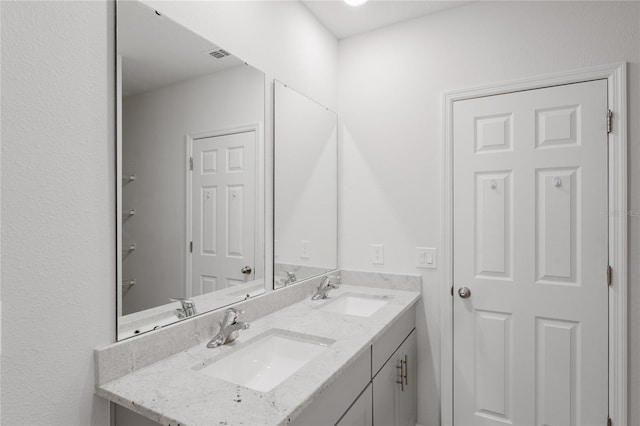 349 Guadlupe St, Haines City, FL 33844 - bathroom with double vanity and a sink