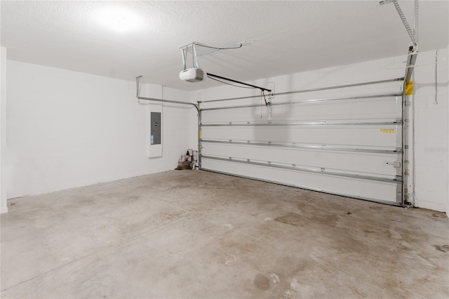 349 Guadlupe St, Haines City, FL 33844 - garage with electric panel and a garage door opener