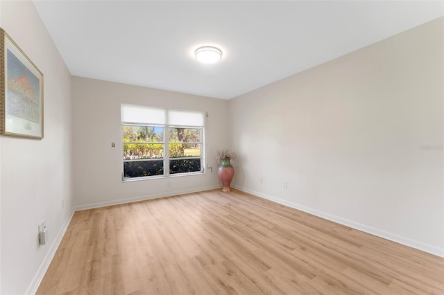 3035 Countryside Blvd Unit 15B, Clearwater, FL 33761 - unfurnished room with light wood-style floors and baseboards