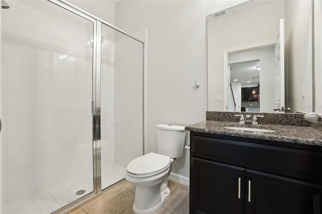 611 Marsh Reed Dr, Winter Garden, FL 34787 - full bathroom featuring vanity, baseboards, toilet, a shower stall, and visible vents