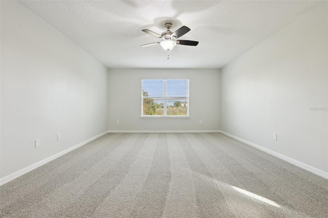 611 Marsh Reed Dr, Winter Garden, FL 34787 - spare room featuring a textured ceiling, light colored carpet, baseboards, and ceiling fan
