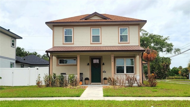 900 S Maple Ave, Sanford, FL 32771 - view of front facade featuring a porch, metal roof, and stucco siding