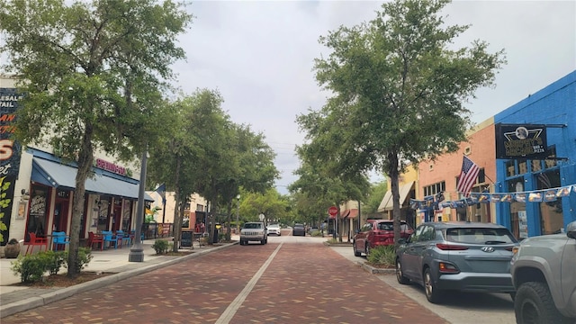 900 S Maple Ave, Sanford, FL 32771 - view of decorative street with traffic signs, sidewalks, curbs, and street lights