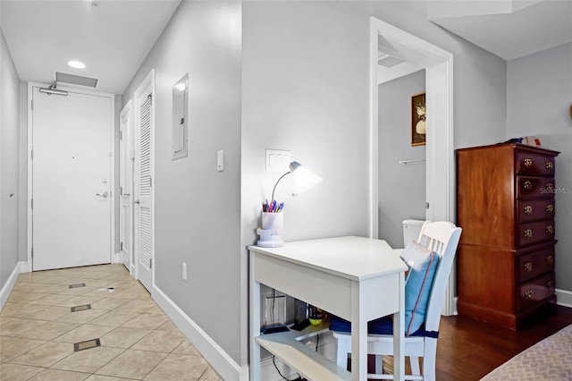 101 S Eola Dr Unit 1018, Orlando, FL 32801 - corridor featuring recessed lighting, light tile patterned floors, and baseboards