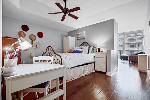 101 S Eola Dr Unit 1018, Orlando, FL 32801 - bedroom featuring a ceiling fan and dark wood-style floors