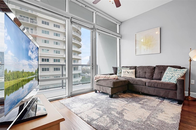101 S Eola Dr Unit 1018, Orlando, FL 32801 - living room with a ceiling fan and wood finished floors