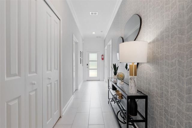 2400 Reading Trl, Kissimmee, FL 34746 - hallway featuring visible vents, baseboards, ornamental molding, and light tile patterned floors