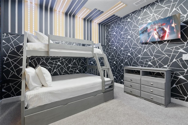2400 Reading Trl, Kissimmee, FL 34746 - carpeted bedroom with wallpapered walls and visible vents