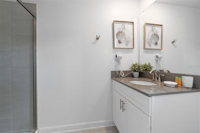 2400 Reading Trl, Kissimmee, FL 34746 - bathroom featuring vanity and a shower with door