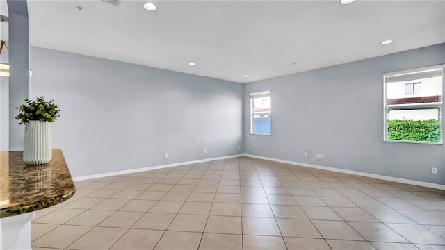 2167 Velvet Leaf Dr, Ocoee, FL 34761 - spare room featuring light tile patterned floors, baseboards, and recessed lighting