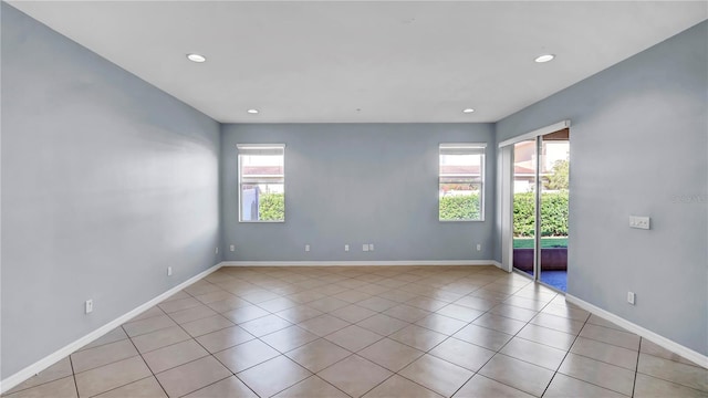 2167 Velvet Leaf Dr, Ocoee, FL 34761 - unfurnished room with light tile patterned floors, baseboards, and recessed lighting
