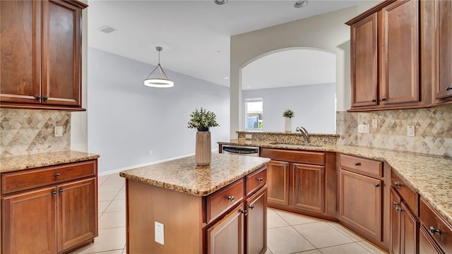 2167 Velvet Leaf Dr, Ocoee, FL 34761 - kitchen featuring light tile patterned flooring, a sink, and light stone countertops