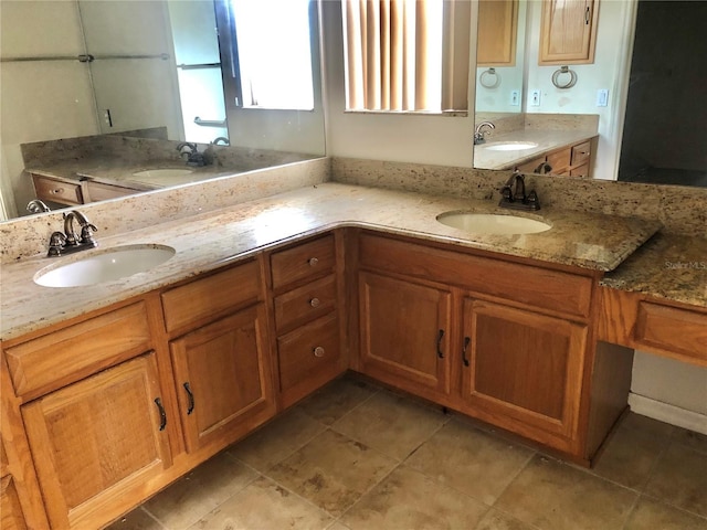 1805 San Luis Ln, The Villages, FL 32159 - bathroom with tile patterned floors and double vanity