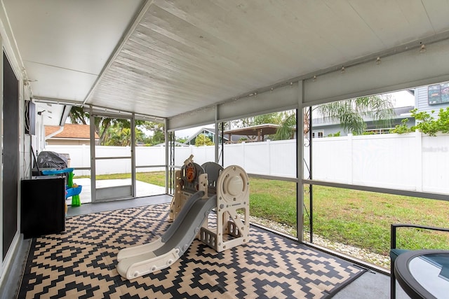 sunroom / solarium with a healthy amount of sunlight
