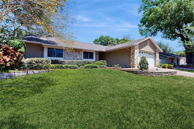 7845 Clubhouse Estates Dr, Orlando, FL 32819 - single story home with stone siding, a front yard, and a garage